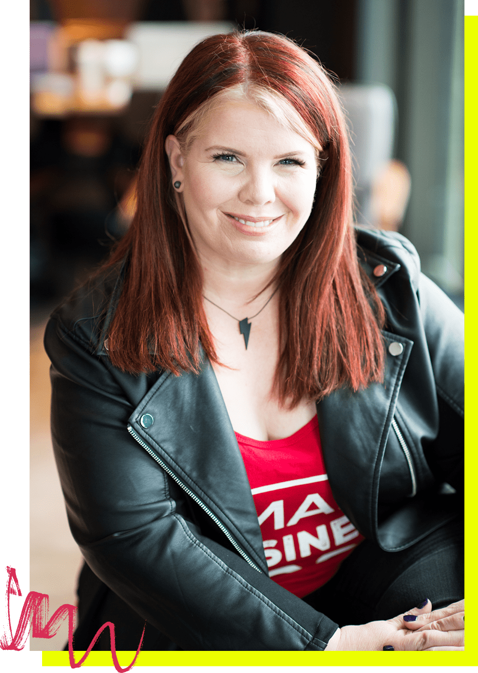 SBB Maggie Patterson Maggie Patterson in a leather jacket and red shirt